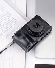 Ricoh GR IV metal handle with base enhances grip feeling and features an ultra-thin base plate design